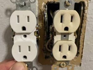 Childproof electrical outlets side by side, showcasing tamper-resistant design for enhanced safety in homes with young children.